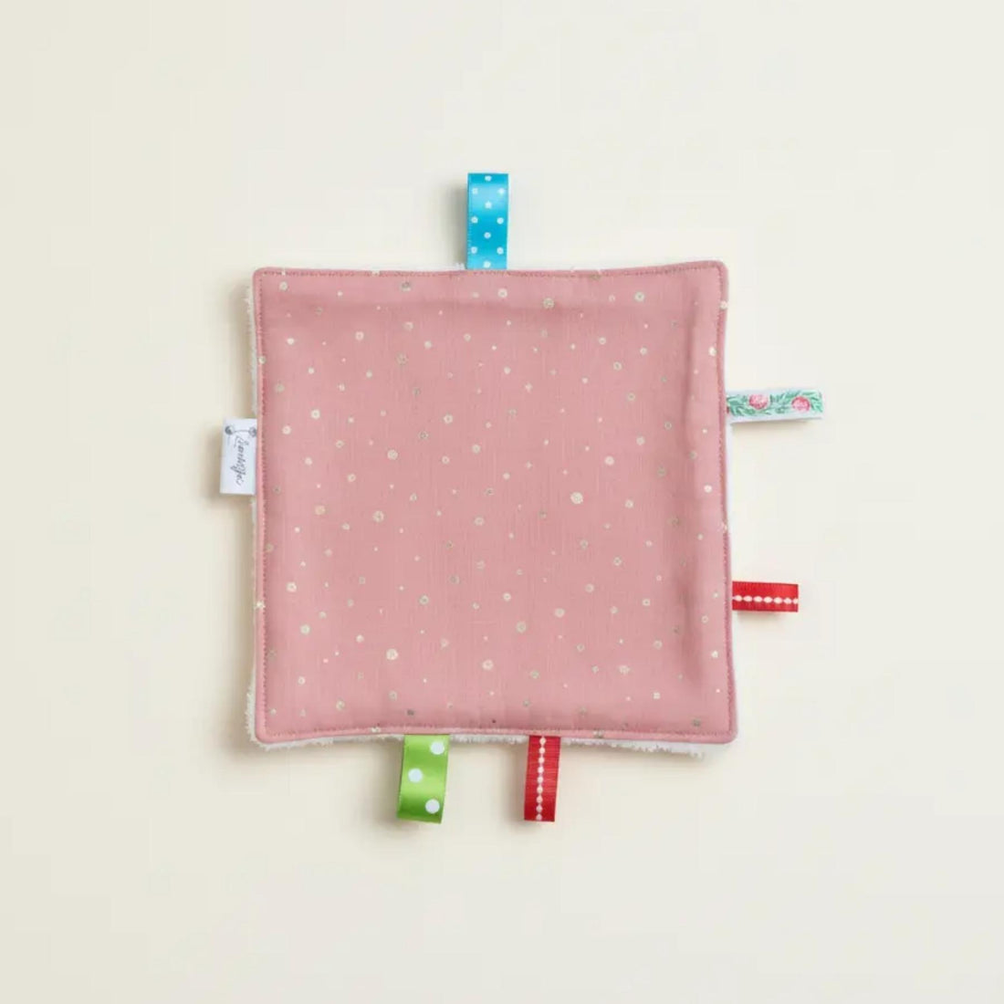 Handgemaakt knisperdoekje Glitter Dots blush van Leonietje’s met labeltjes en witte badstof