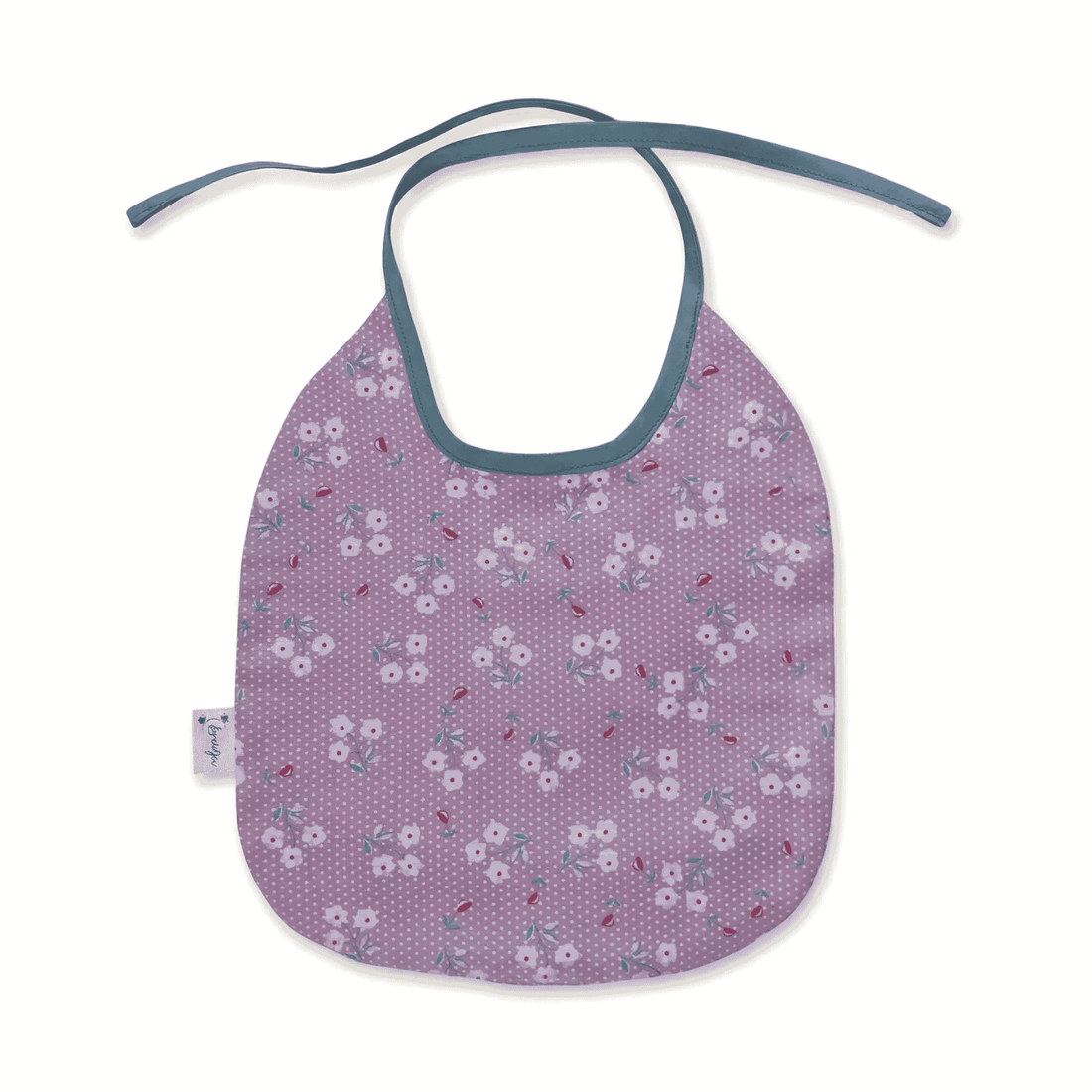 Schattig baby slabbetje bloemen en stippen motief met vintage groen biaisband, bovenaanzicht